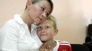 Россиянка Инга Рентала со своим сыном Робертом. Фото: Игорь Самойлов / РИА Новости